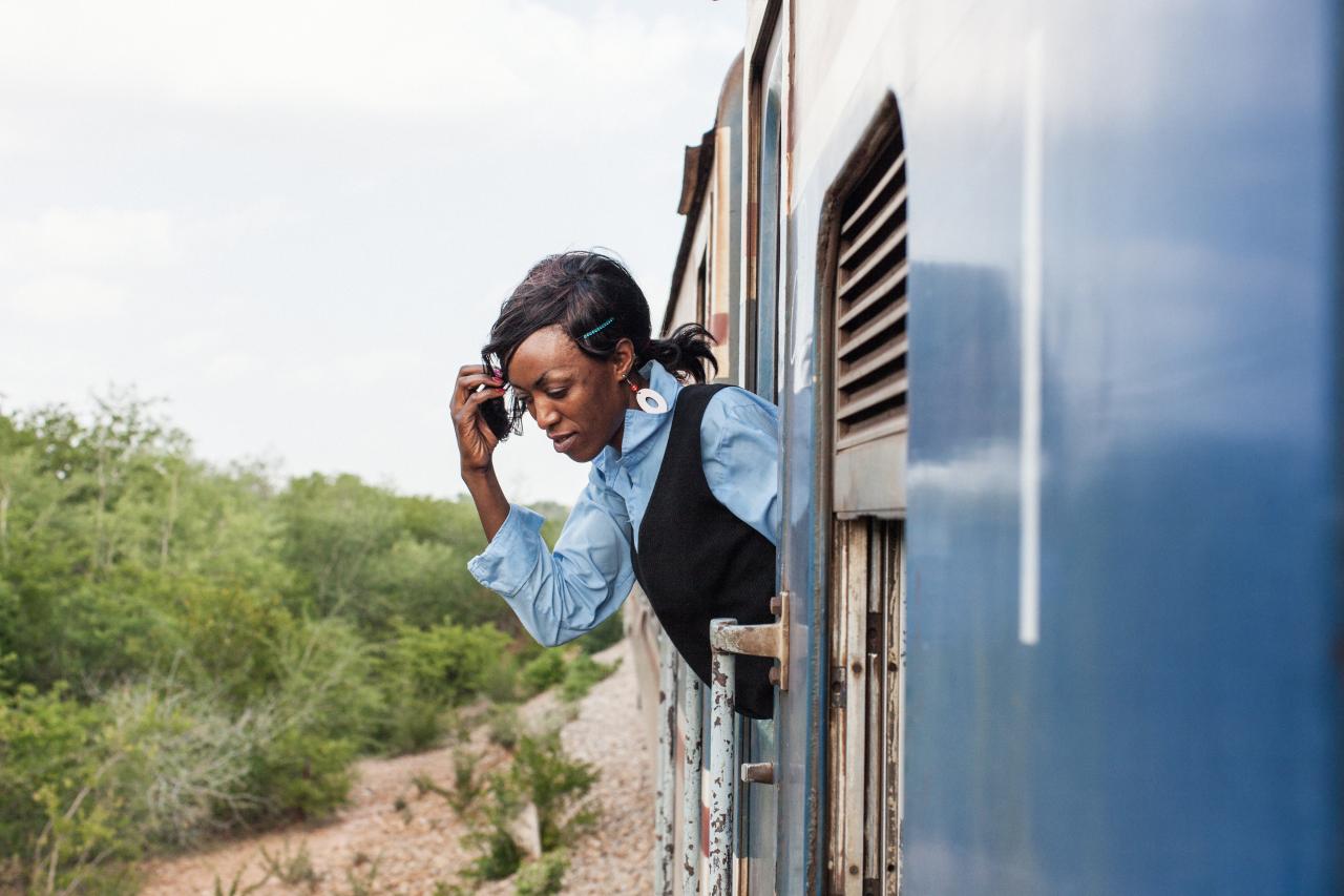 woman looking out window